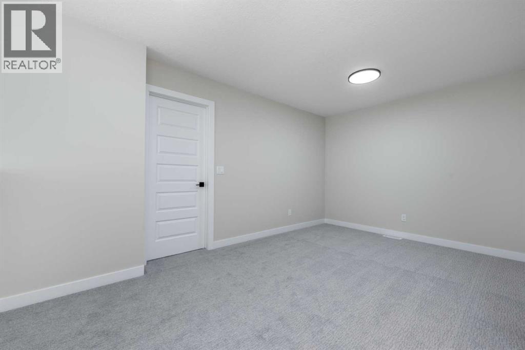 92 Waterford Manor, Chestermere, Alberta  T1X 2T9 - Photo 16 - A2233048