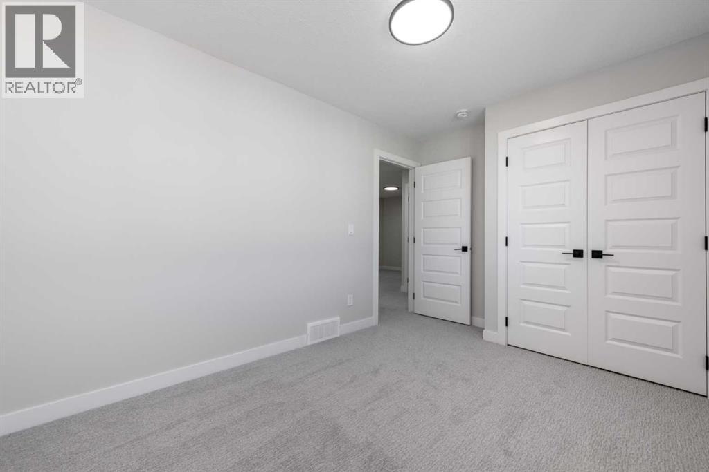 92 Waterford Manor, Chestermere, Alberta  T1X 2T9 - Photo 24 - A2233048