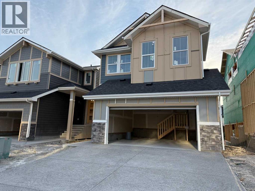 111 Sundown Crescent, Cochrane, Alberta  T4C 1Y3 - Photo 2 - A2252118