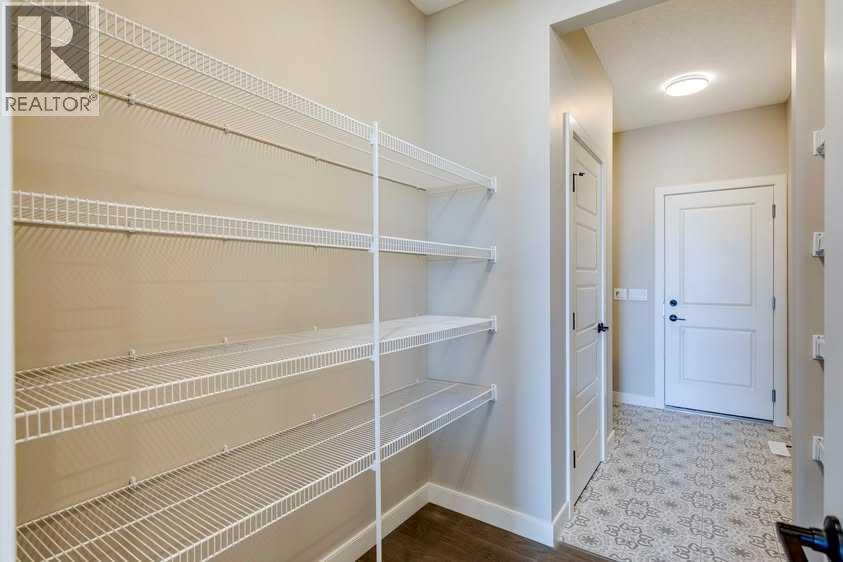 111 Sundown Crescent, Cochrane, Alberta  T4C 1Y3 - Photo 8 - A2252118