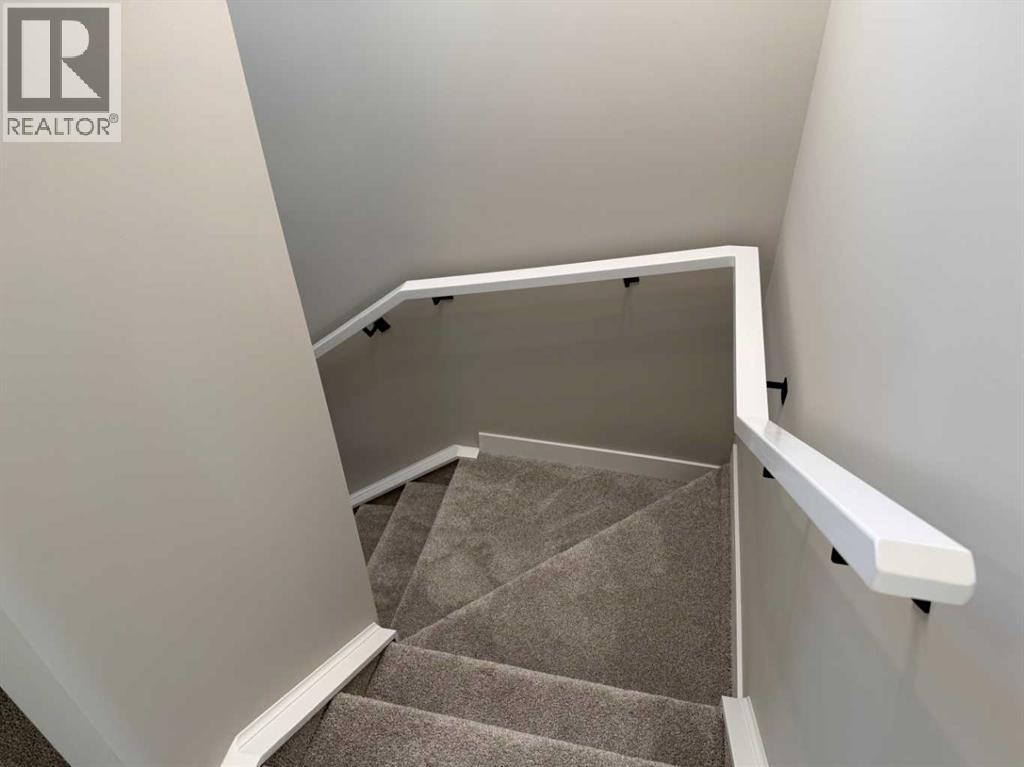 302 Sundown Road, Cochrane, Alberta  T4C 3H2 - Photo 30 - A2256036