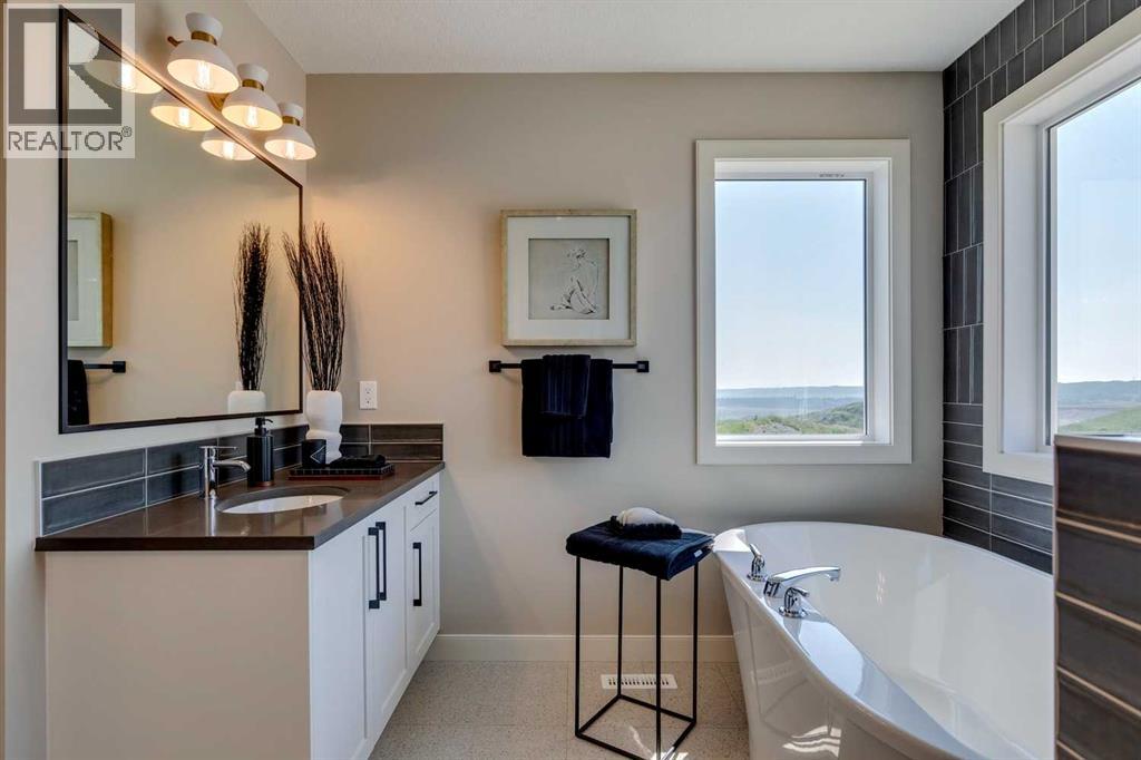 93 Sunrise Heath, Cochrane, Alberta  T4C 3C5 - Photo 38 - A2214762