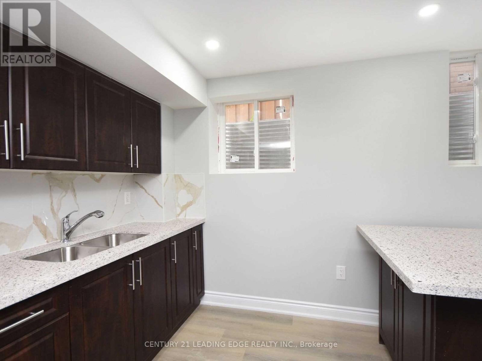 Bsmt - 13 Frampton Road, Brampton, Ontario L7A 4C9 - Photo 2 - W12607008