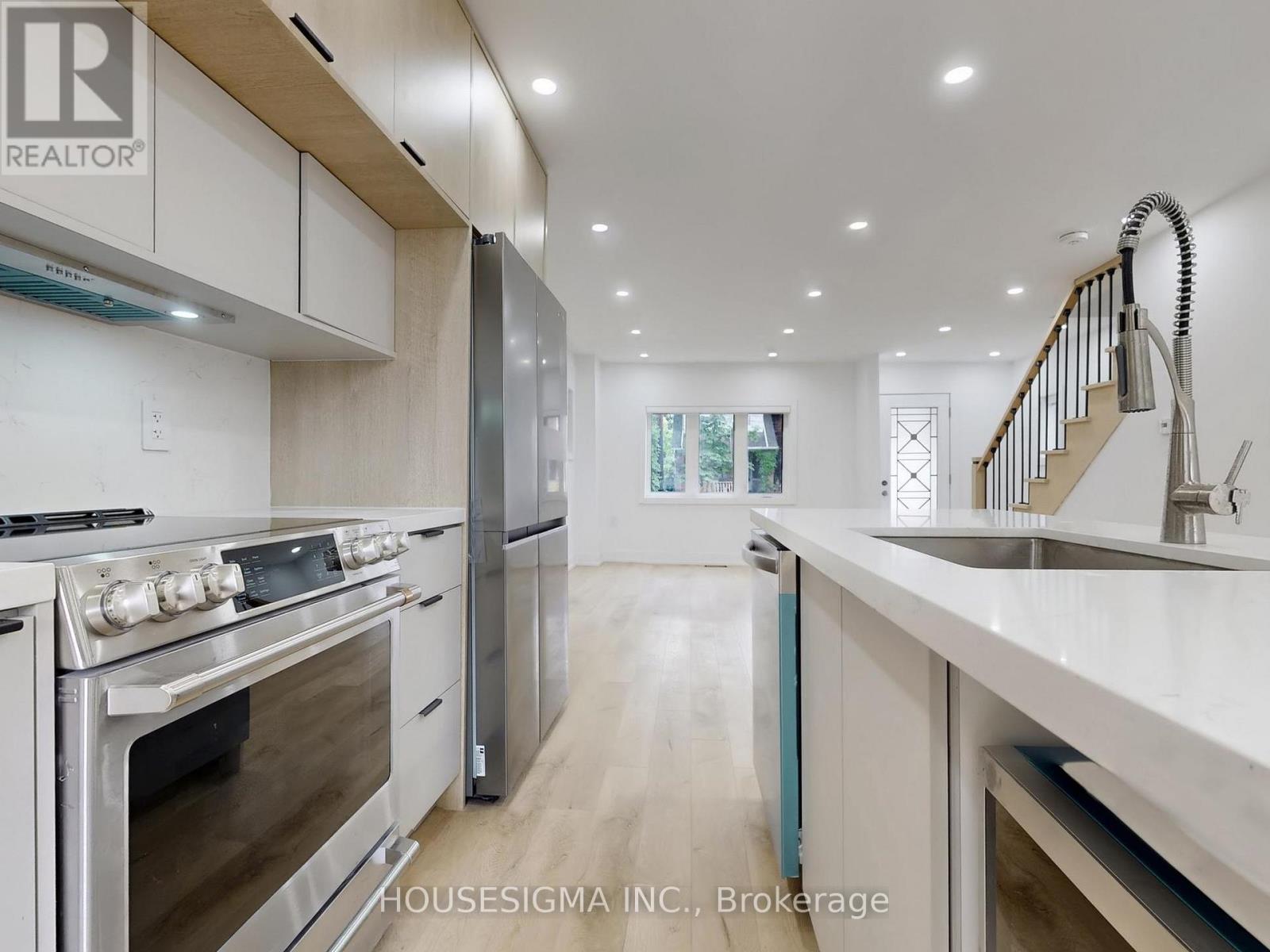 Main - 243 Windermere Avenue, Toronto, Ontario  M6S 3K4 - Photo 11 - W12607038