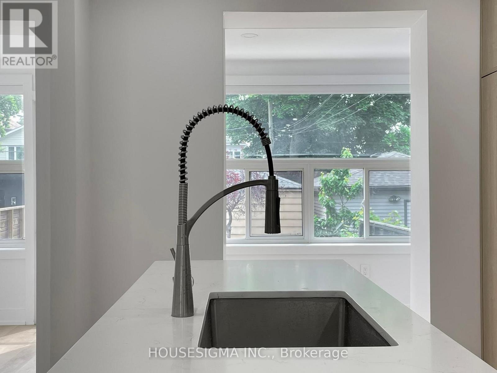 Main - 243 Windermere Avenue, Toronto, Ontario  M6S 3K4 - Photo 13 - W12607038