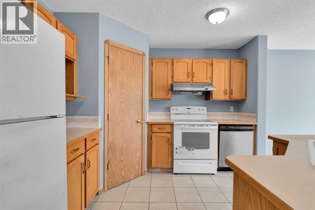 15 Harvest Rose Circle Ne, Calgary, Alberta  T3K 4M5 - Photo 4 - A2268908