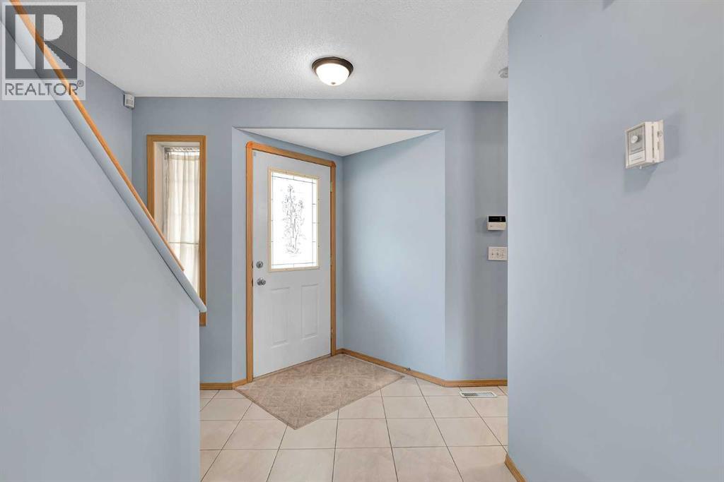 15 Harvest Rose Circle Ne, Calgary, Alberta  T3K 4M5 - Photo 2 - A2268908