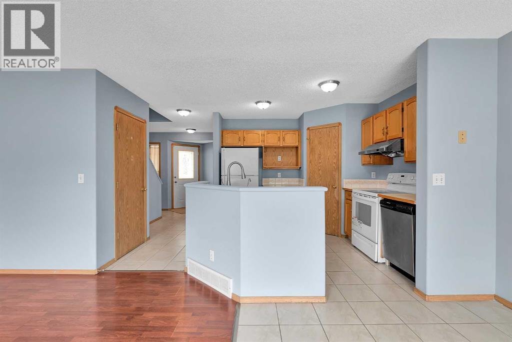 15 Harvest Rose Circle Ne, Calgary, Alberta  T3K 4M5 - Photo 7 - A2268908