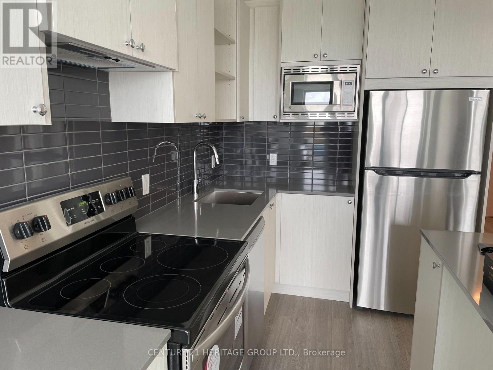 404 - 60 George Butchart Drive, Toronto, Ontario  M3K 0E1 - Photo 4 - W12607162