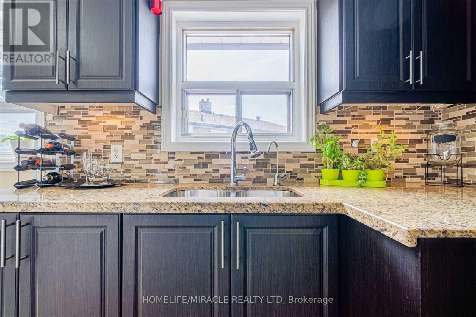 Main - 49 Tinton Crescent, Toronto, Ontario  M9V 2H9 - Photo 5 - W12607334