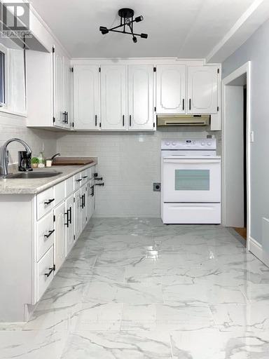 Lower Level - 9a Winfield Avenue, Toronto, Ontario  M6S 2J7 - Photo 13 - W12607370