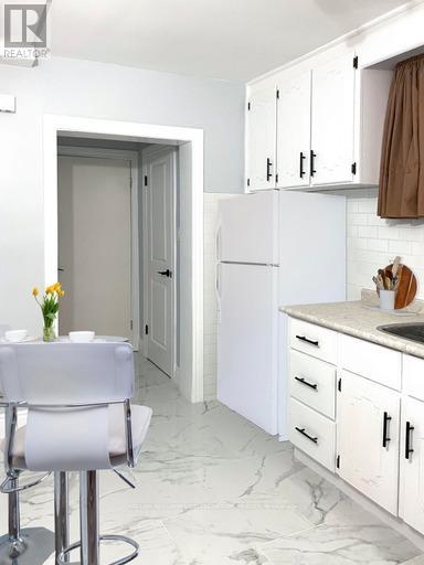 Lower Level - 9a Winfield Avenue, Toronto, Ontario  M6S 2J7 - Photo 14 - W12607370