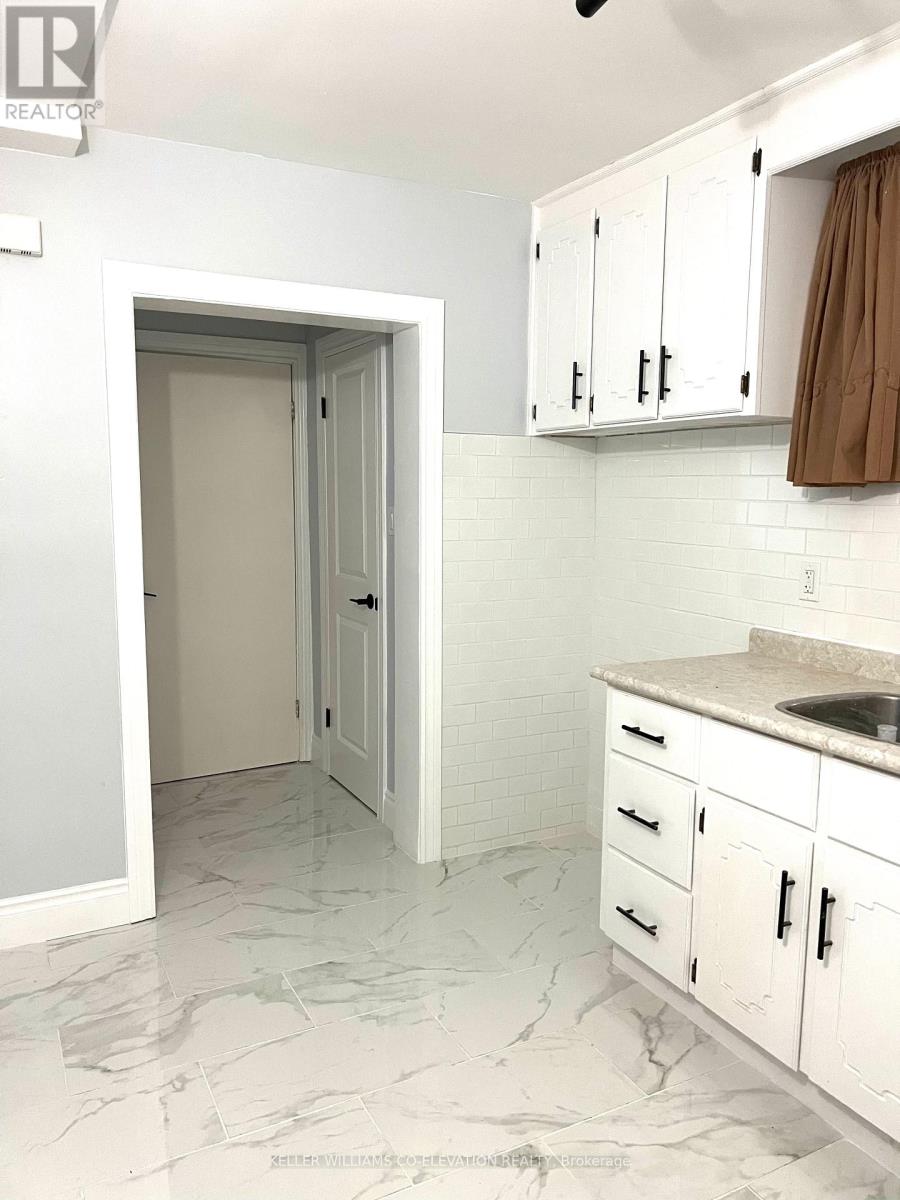 Lower Level - 9a Winfield Avenue, Toronto, Ontario  M6S 2J7 - Photo 15 - W12607370