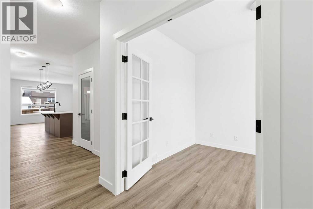 64 Ambleton Street Nw, Calgary, Alberta  T3P 1W5 - Photo 4 - A2273132