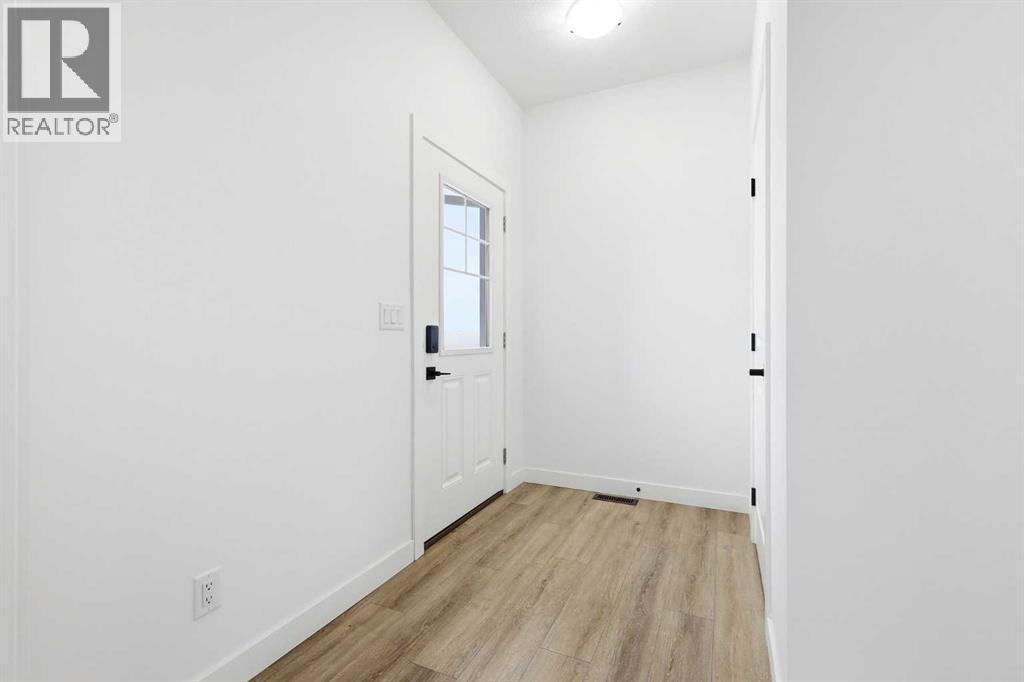 64 Ambleton Street Nw, Calgary, Alberta  T3P 1W5 - Photo 3 - A2273132