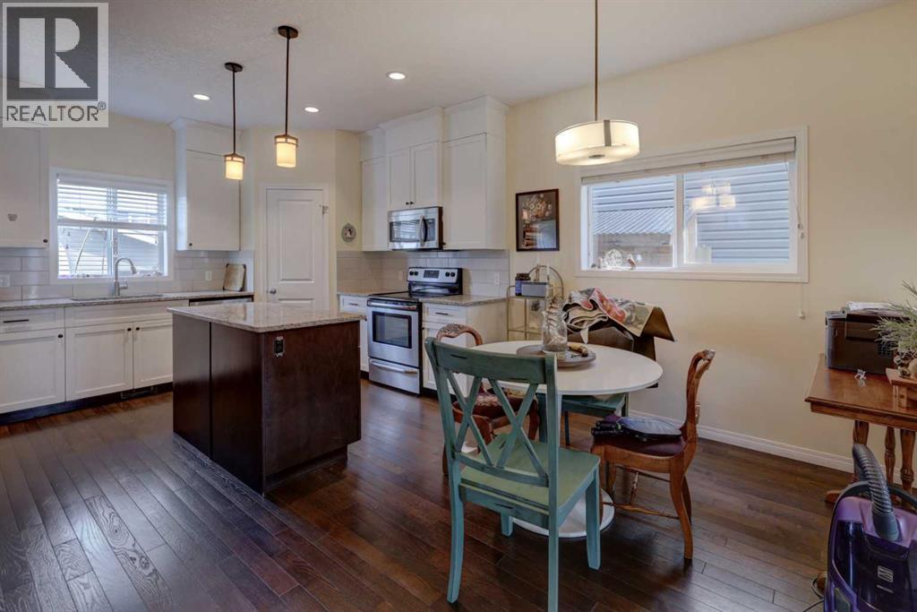 24 Fireside Burrow, Cochrane, Alberta  T4C 0T3 - Photo 3 - A2258134