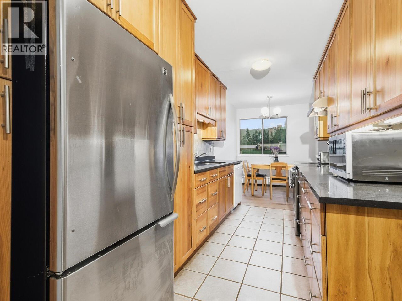 312 3901 Carrigan Court, Burnaby, British Columbia  V3N 4K1 - Photo 5 - R3071088