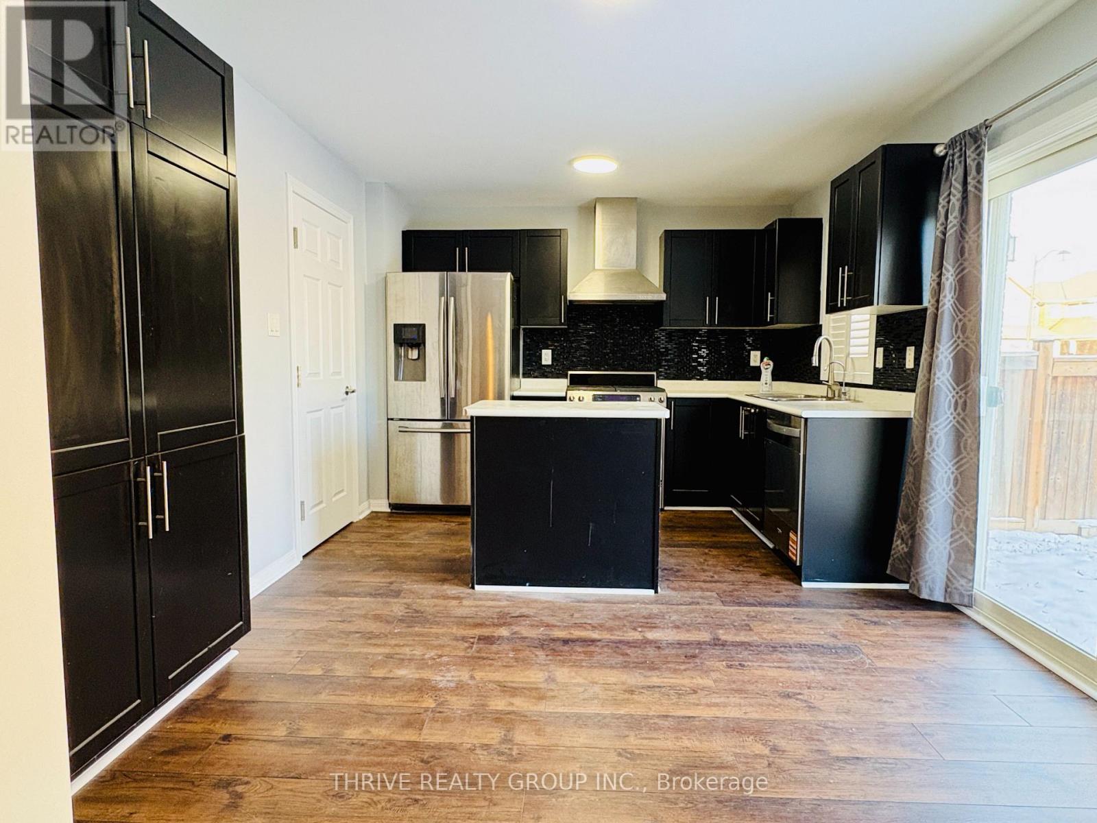 1029 Farmstead. Drive, Milton, Ontario  L9T 8G4 - Photo 6 - W12607900