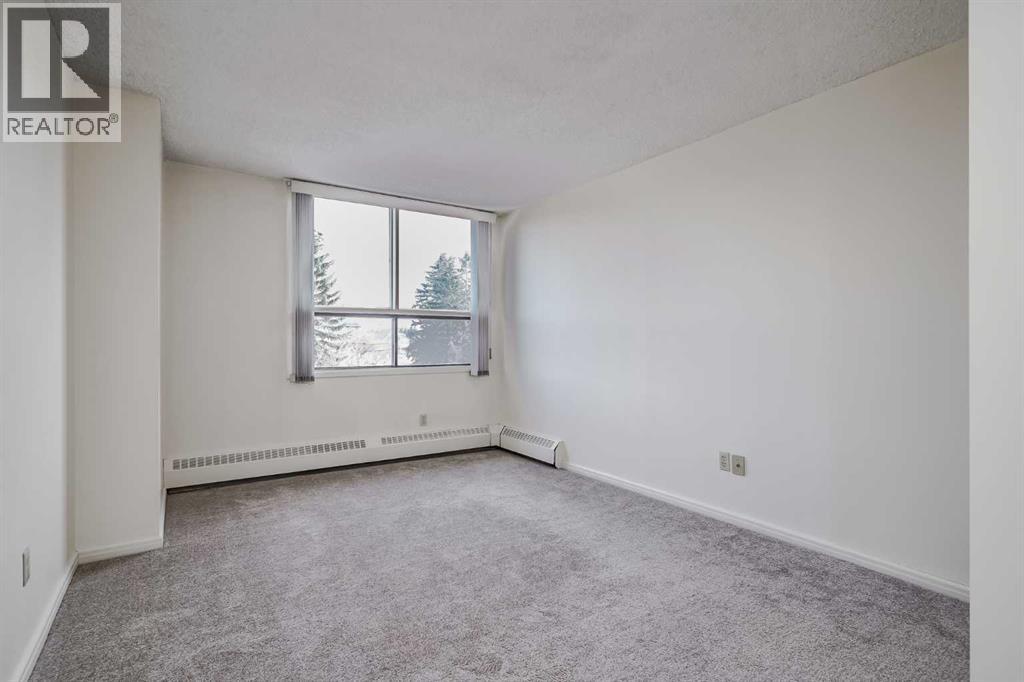 305, 145 Point Drive Nw, Calgary, Alberta  T3B 4W1 - Photo 18 - A2269679