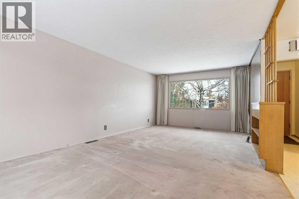 427 Tache Avenue Nw, Calgary, Alberta  T2K 3R6 - Photo 4 - A2273238