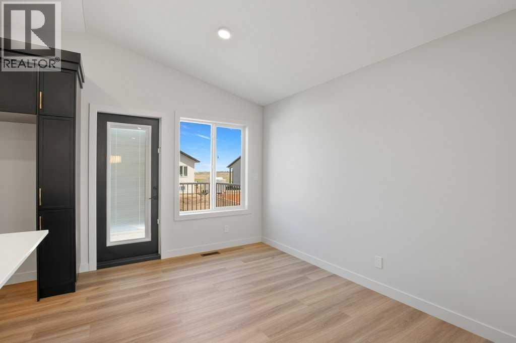 154 Norseman Close, Penhold, Alberta  T0M 1R0 - Photo 7 - A2221980