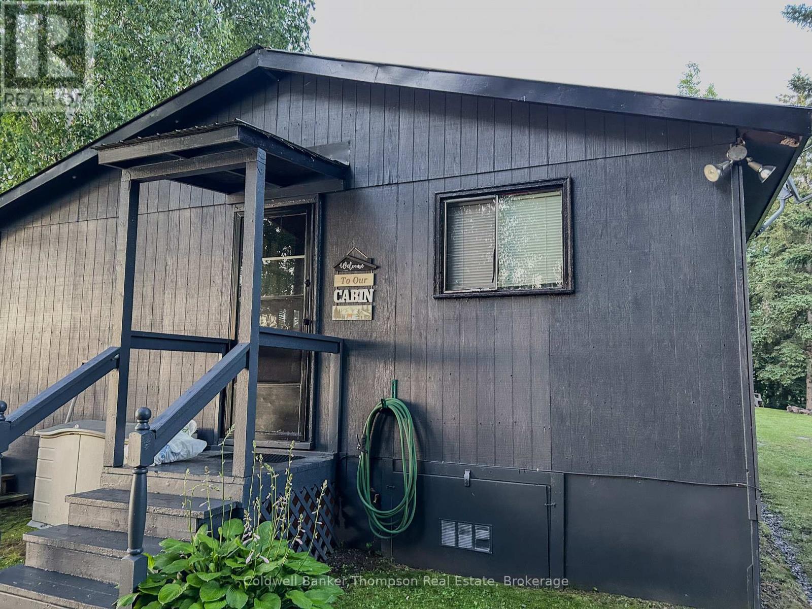 26 Spruce Lane, Magnetawan, Ontario P0A 1C0 - Photo 2 - X12608370