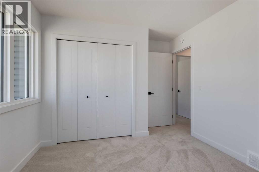 39 Belgian Court, Cochrane, Alberta  T4C 3H5 - Photo 44 - A2264575