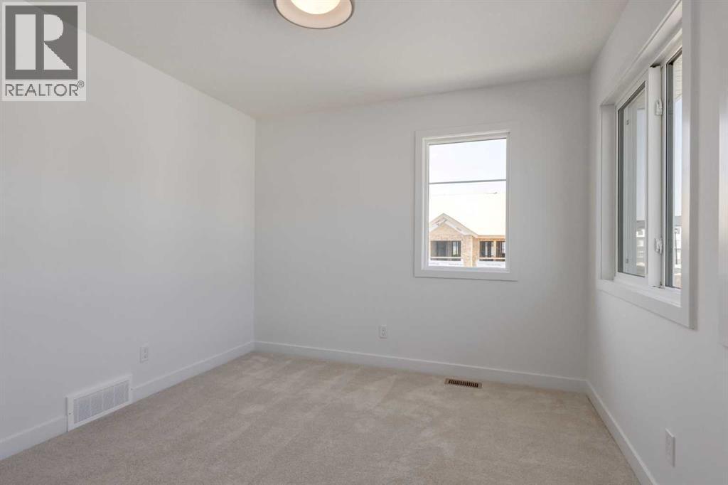 39 Belgian Court, Cochrane, Alberta  T4C 3H5 - Photo 46 - A2264575