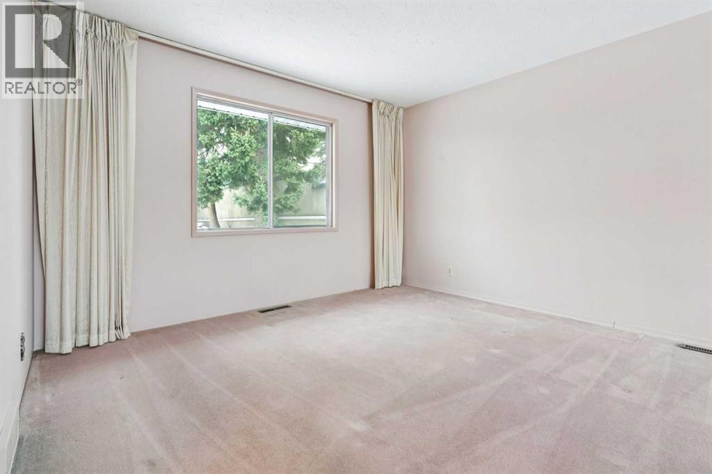 427 Tache Avenue Nw, Calgary, Alberta  T2K 3R6 - Photo 5 - A2273238