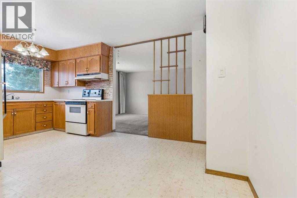 427 Tache Avenue Nw, Calgary, Alberta  T2K 3R6 - Photo 6 - A2273238