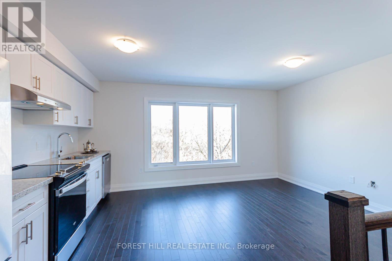 2 - 37 Wild Rose Gardens, Toronto, Ontario  M6L 0A5 - Photo 3 - W12608738