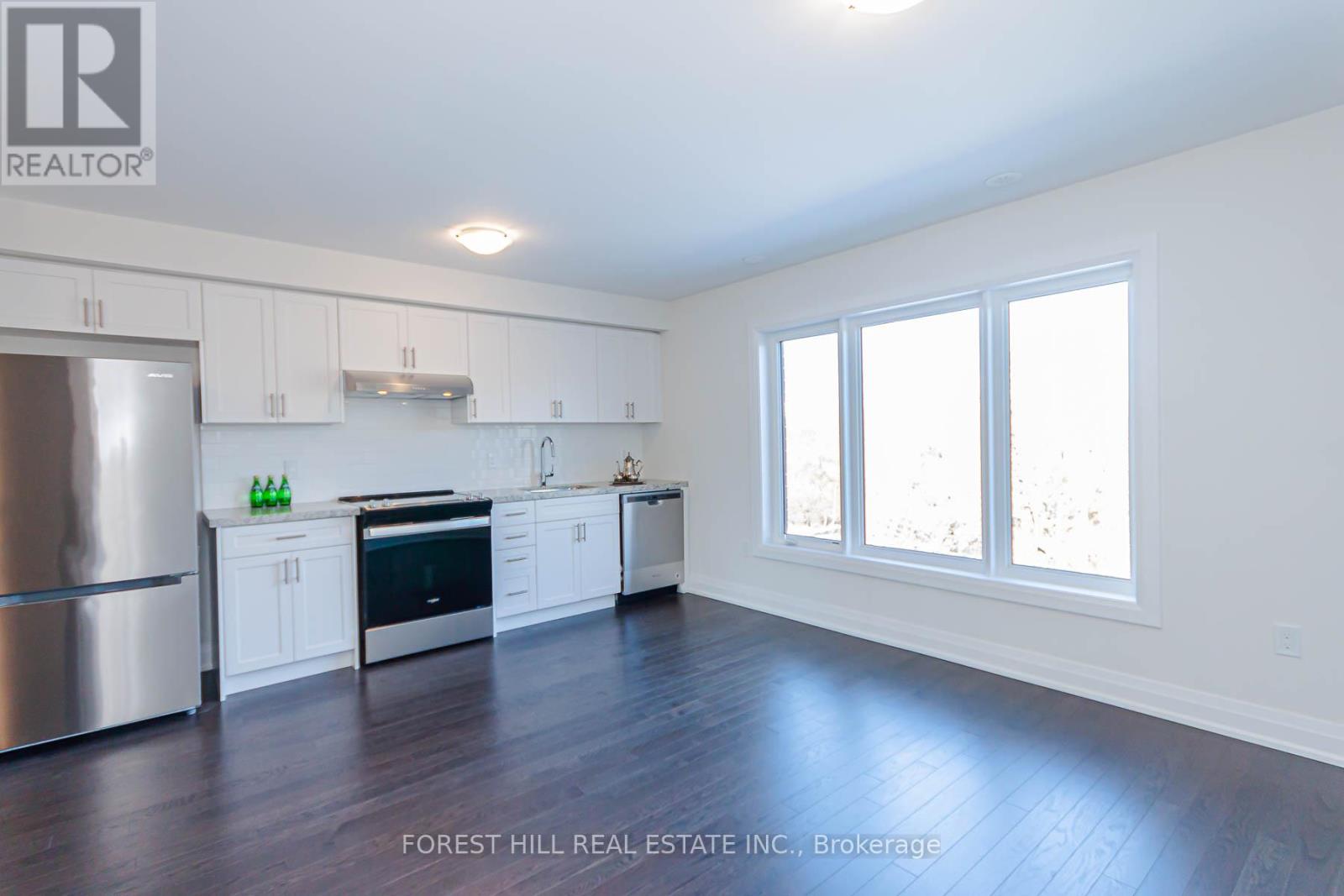 2 - 37 Wild Rose Gardens, Toronto, Ontario  M6L 0A5 - Photo 4 - W12608738