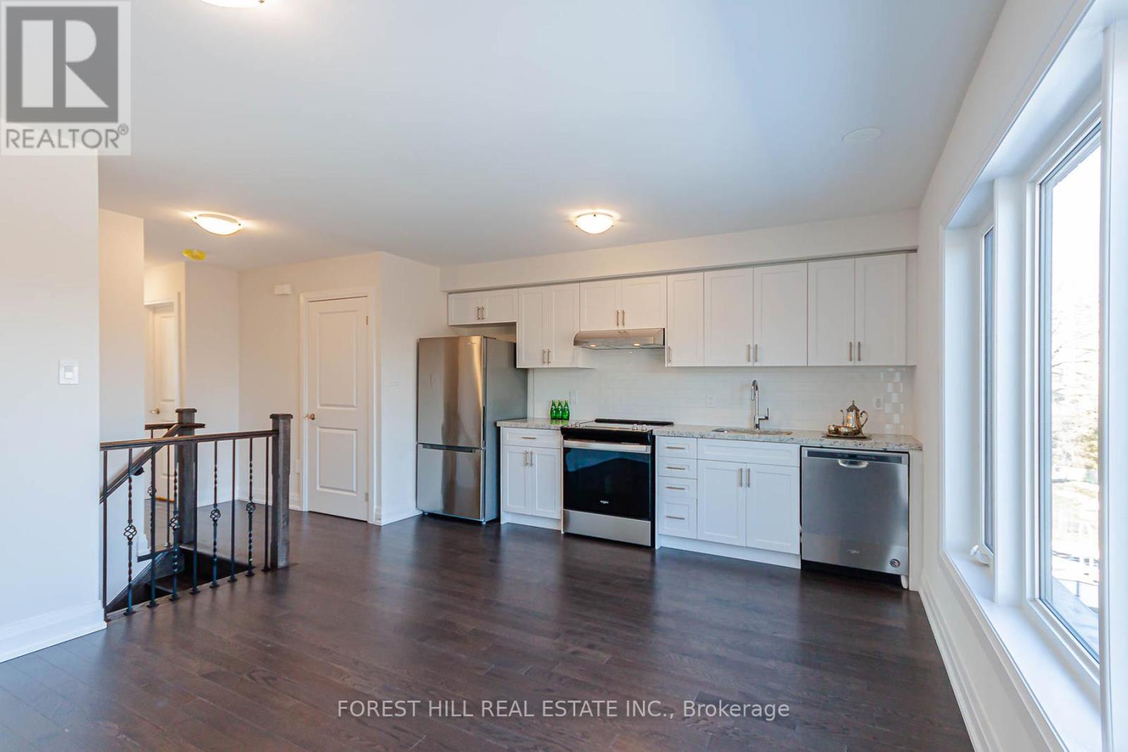 2 - 37 Wild Rose Gardens, Toronto, Ontario  M6L 0A5 - Photo 5 - W12608738