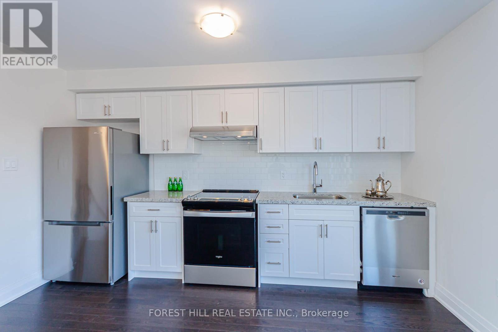 2 - 37 Wild Rose Gardens, Toronto, Ontario  M6L 0A5 - Photo 6 - W12608738