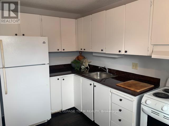 E - 14 Larkshire Lane, Ottawa, Ontario  K2J 1Y6 - Photo 5 - X12608822