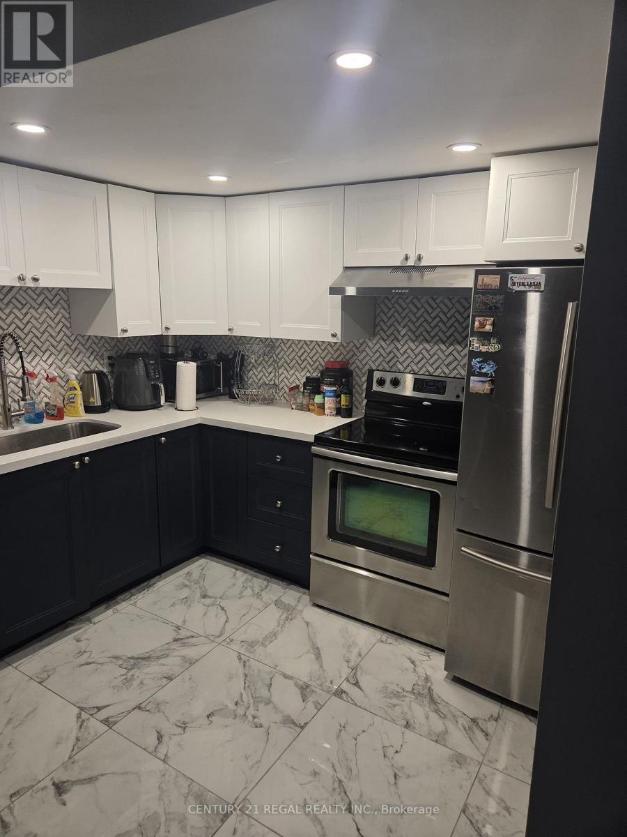 102 - 360 Ridelle Avenue, Toronto, Ontario  M6B 1K1 - Photo 2 - W12608714