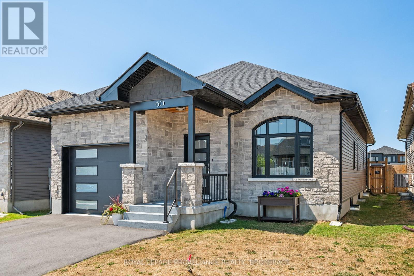 60 Potter Drive, Loyalist, Ontario K0H 2H0 - Photo 3 - X12383077