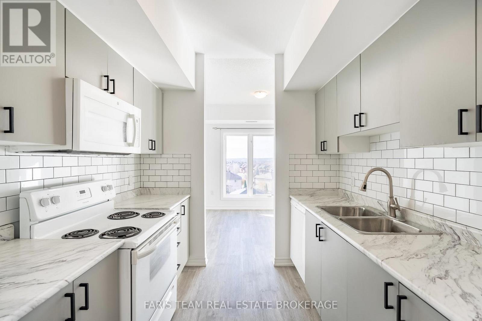 402 - 100 Dean Avenue, Barrie, Ontario L9J 0H1 - Photo 6 - S12581196