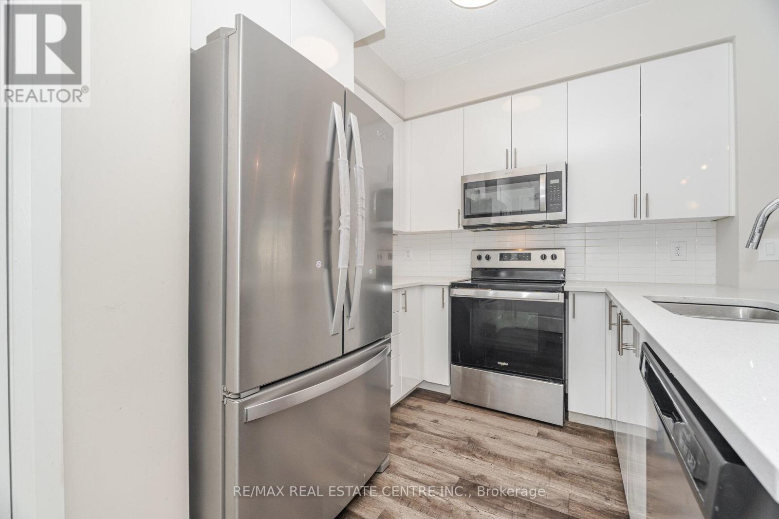 320 - 610 Farmstead Drive, Milton, Ontario  L9T 8X5 - Photo 11 - W12608900