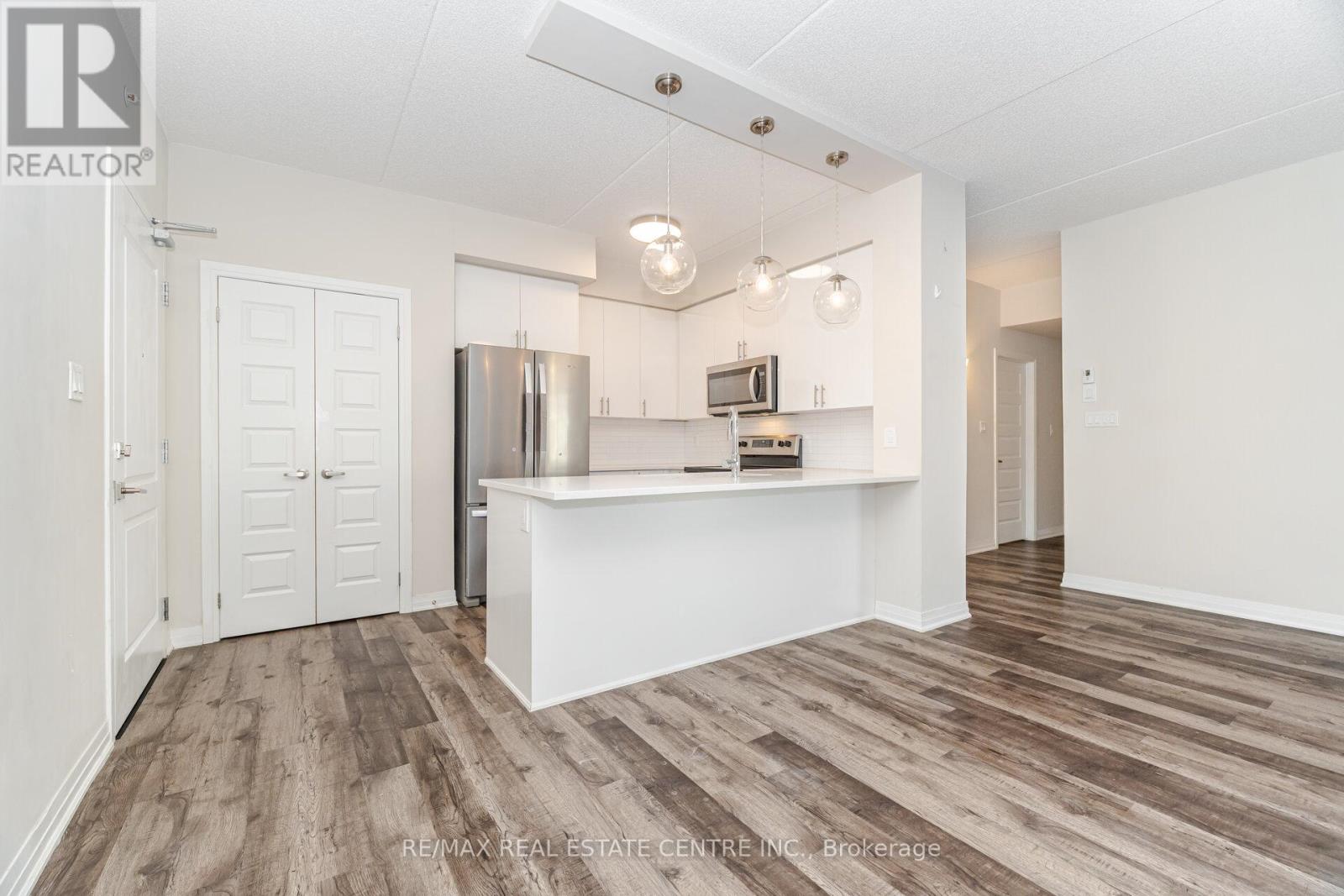 320 - 610 Farmstead Drive, Milton, Ontario  L9T 8X5 - Photo 14 - W12608900