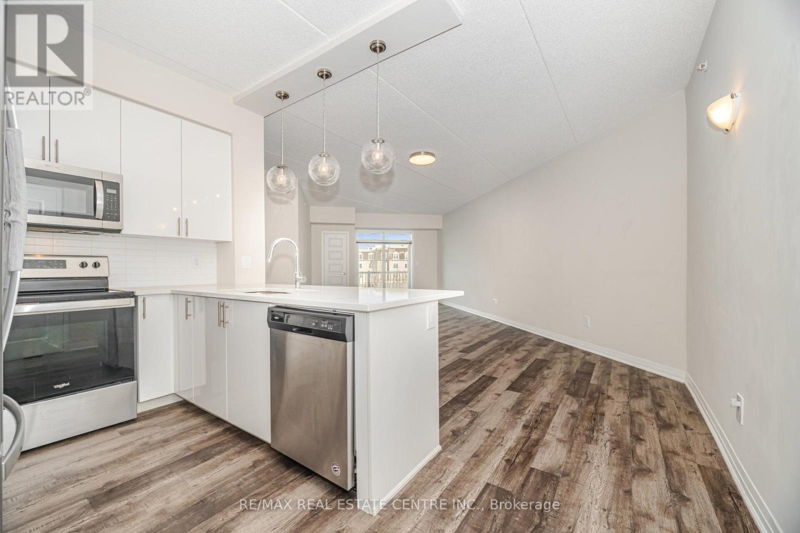 320 - 610 Farmstead Drive, Milton, Ontario  L9T 8X5 - Photo 9 - W12608900