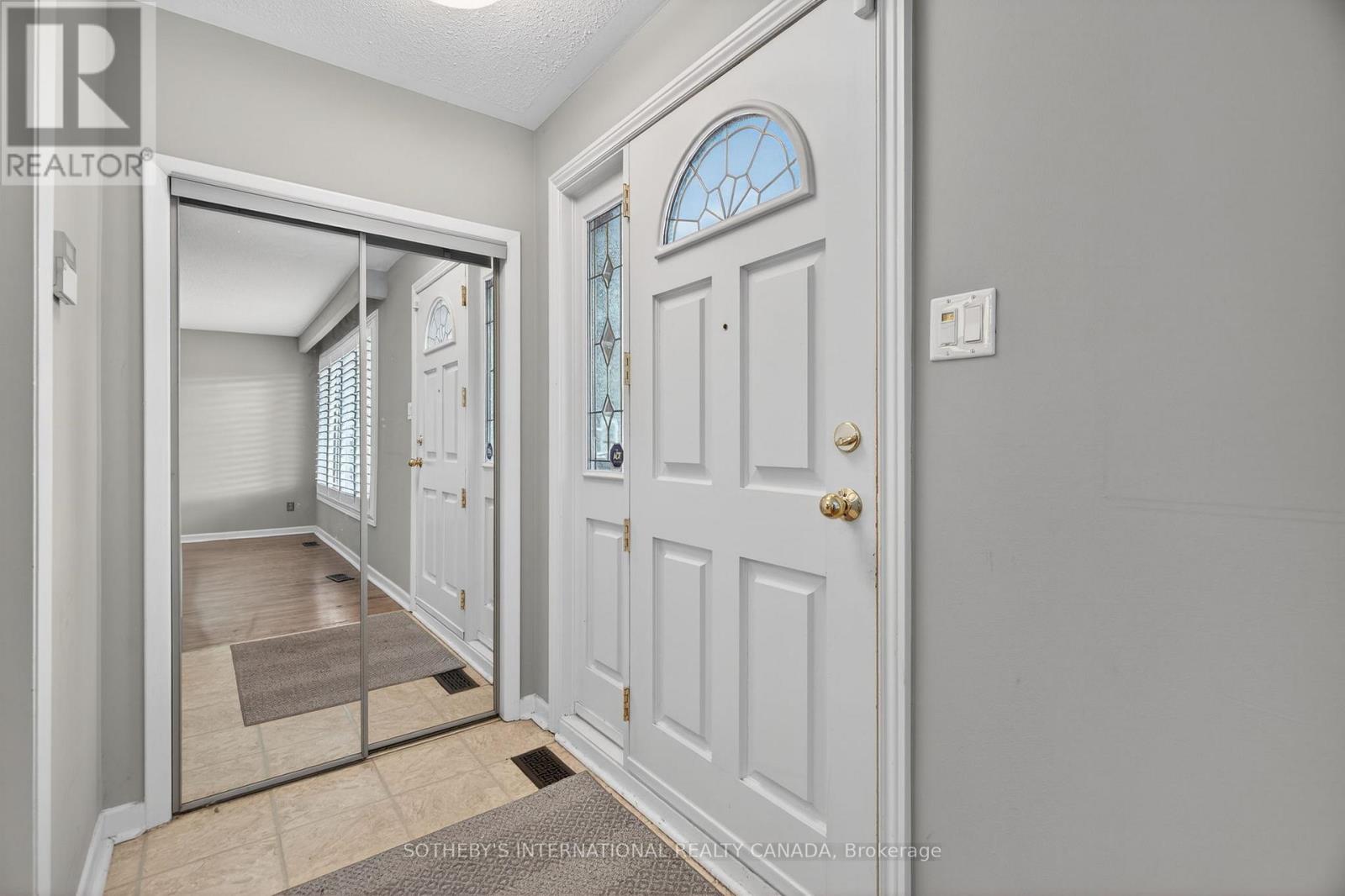 80 Guernsey Drive, Toronto, Ontario  M9C 3A7 - Photo 6 - W12608946