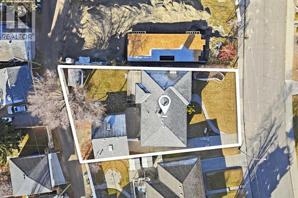 2219 Halifax Crescent Nw, Calgary, Alberta  T2M 4E1 - Photo 3 - A2270302