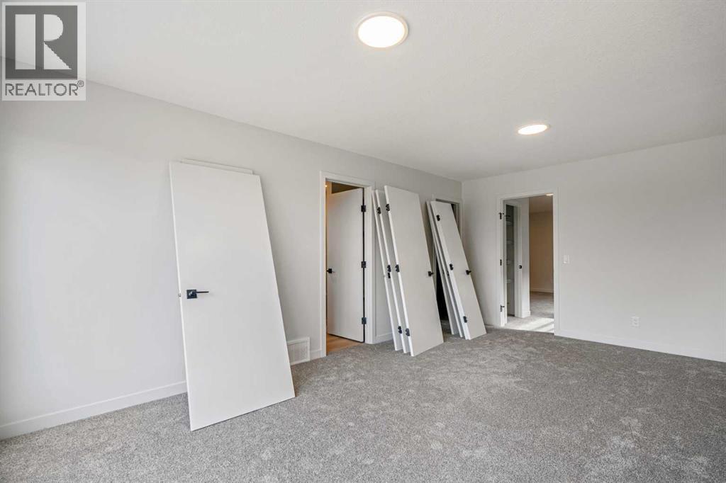 46 Heritage Heath, Cochrane, Alberta  T0T 0T0 - Photo 25 - A2262940