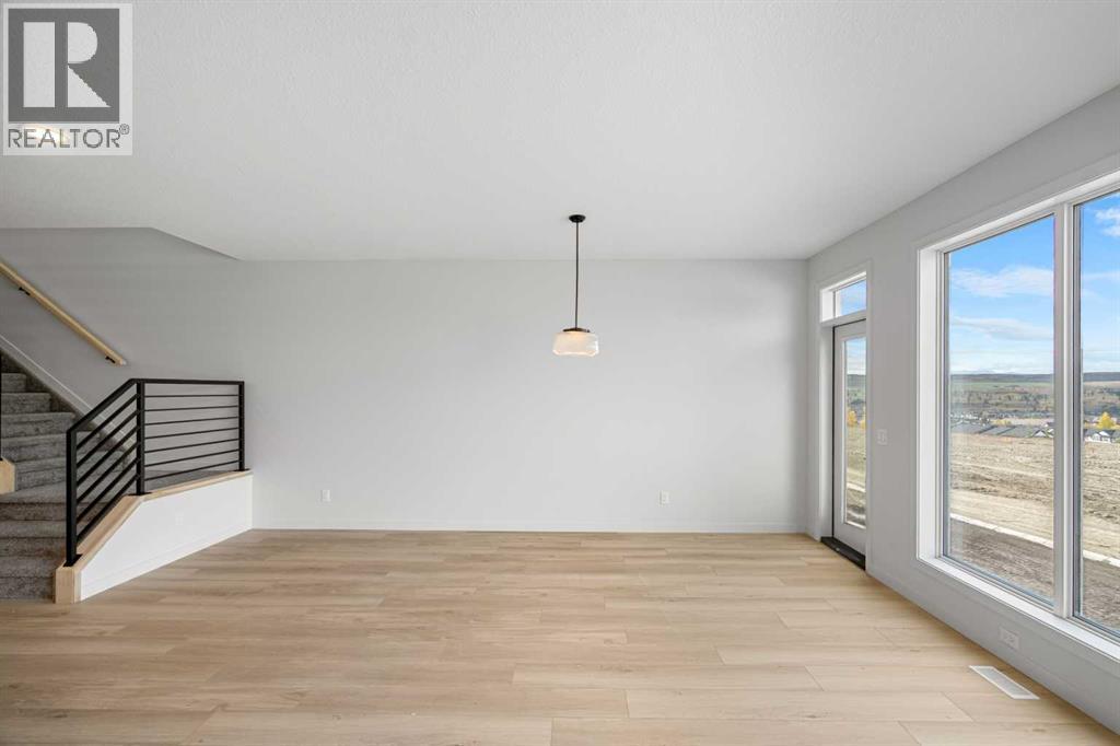 46 Heritage Heath, Cochrane, Alberta  T0T 0T0 - Photo 9 - A2262940