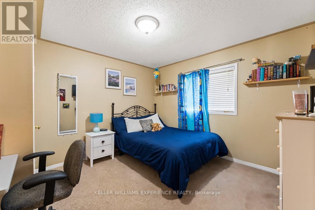 38 Truax Crescent, Essa, Ontario  L3W 0C2 - Photo 12 - N12474464