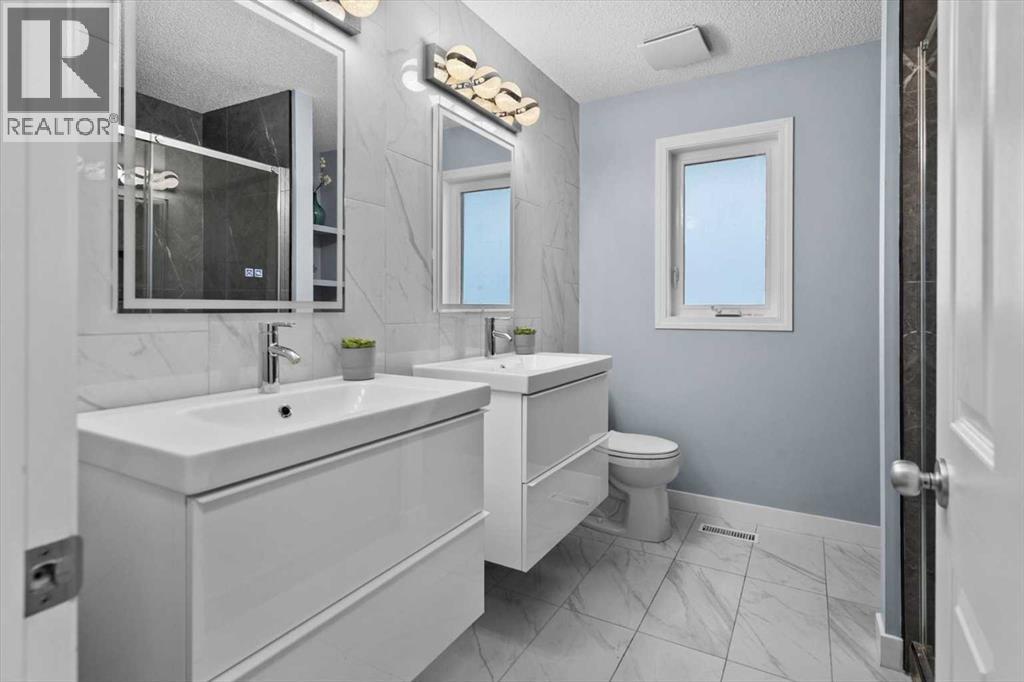 21 Rockbluff Place Nw, Calgary, Alberta  T3G 5B1 - Photo 38 - A2272750