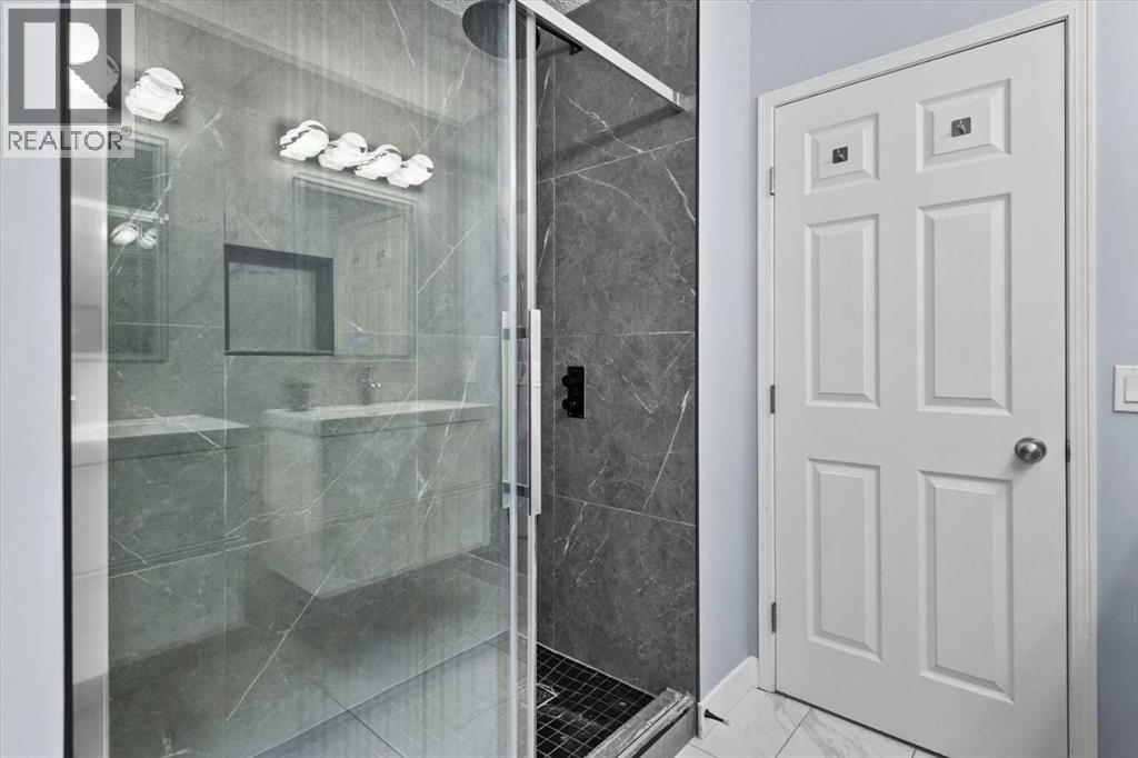 21 Rockbluff Place Nw, Calgary, Alberta  T3G 5B1 - Photo 39 - A2272750