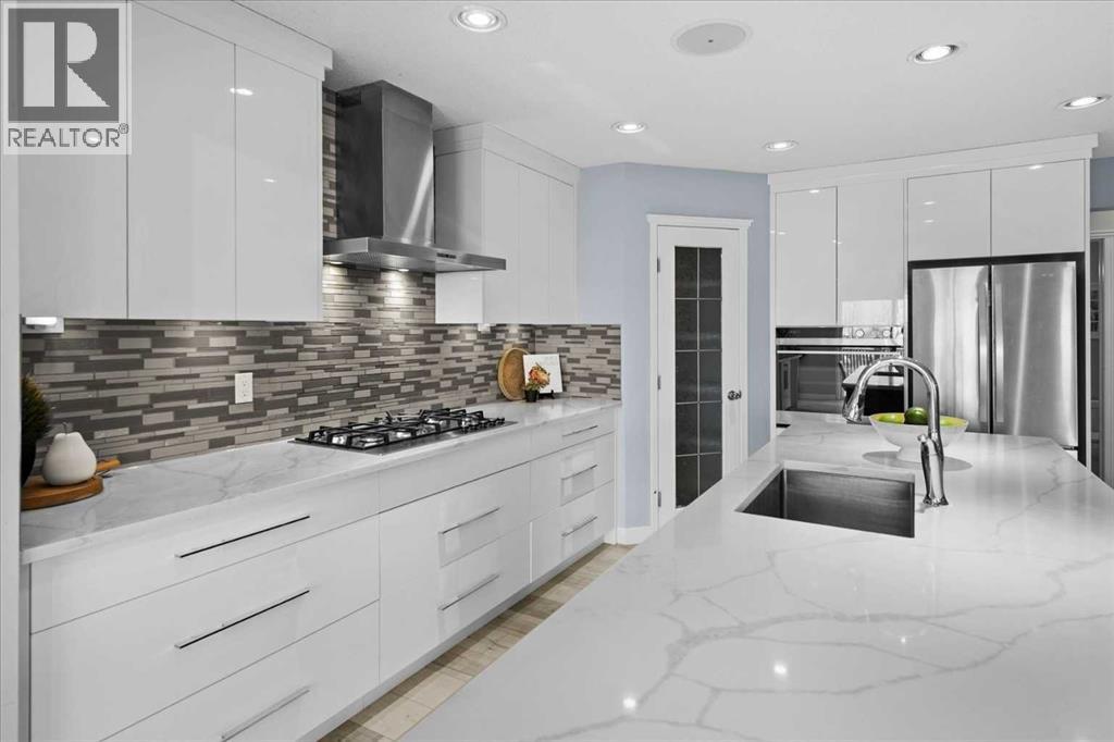 21 Rockbluff Place Nw, Calgary, Alberta  T3G 5B1 - Photo 3 - A2272750