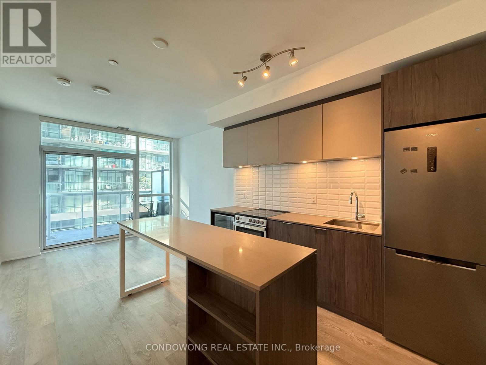 406 - 65 Annie Craig Drive, Toronto, Ontario  M8V 0G3 - Photo 1 - W12505308